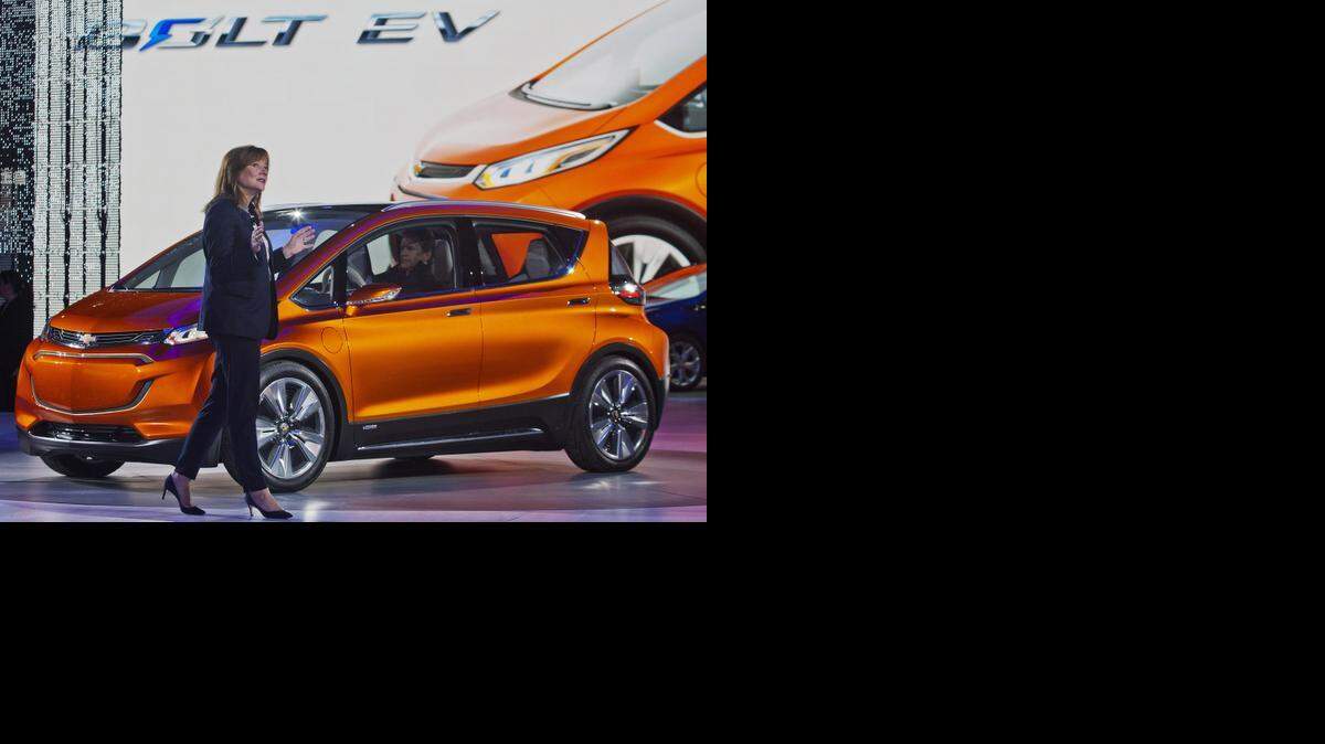 
General Motors CEO Mary Barra presents the Bolt EV electric concept vehicle at the North American International Auto Show, Monday, Jan. 12, 2015, in Detroit. 
