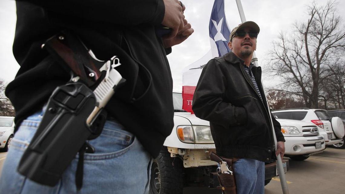 A group of open-carry supporters gathered in Arlington on Friday, Jan. 1, 2016, to celebrate the new law by openly carrying their handguns.