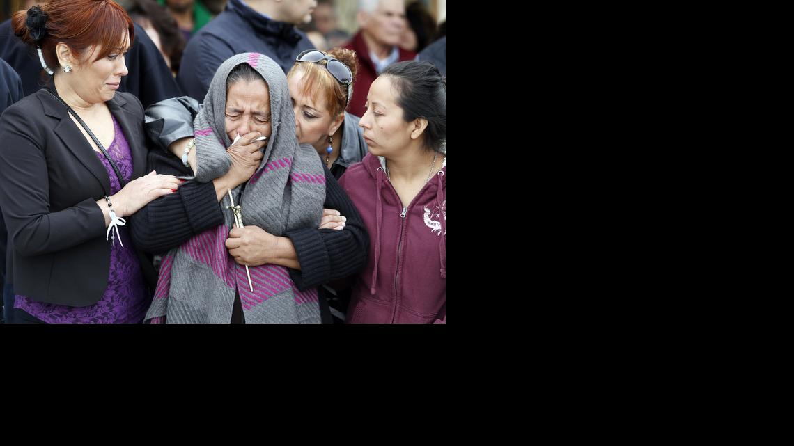 
Agapita Montes-Rivera, second from left, the mother of Antonio Zambano-Montes, is comforted following the funeral for her son Wednesday at St. Patrick’s Catholic Church in Pasco, Wash. Police killed the unarmed man, who spoke little English, after he allegedly threw rocks at officers.
