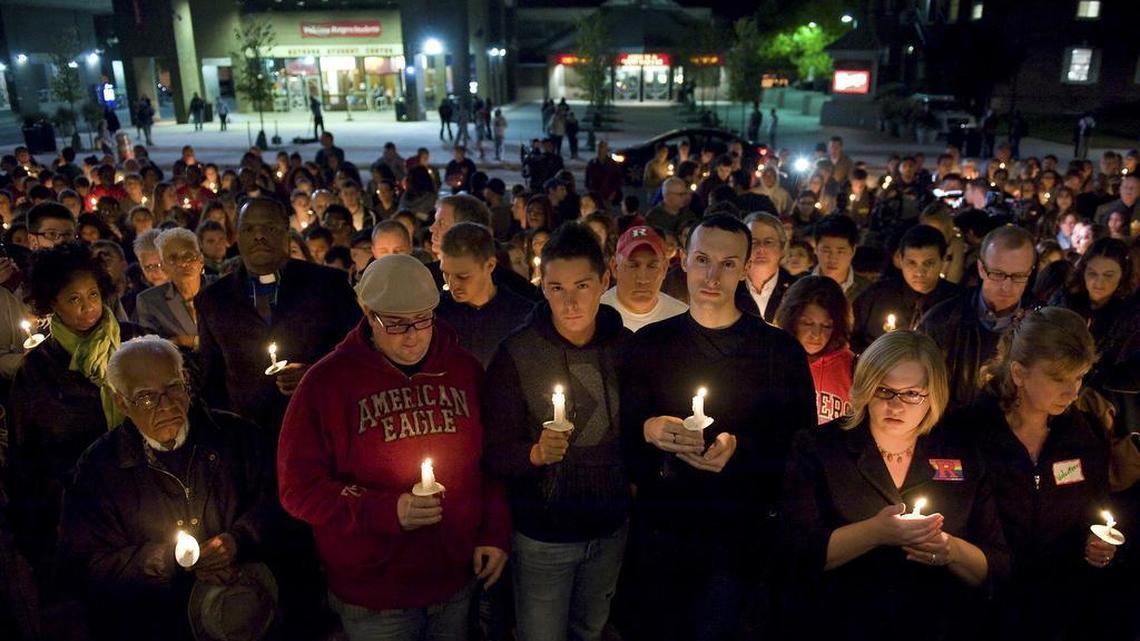 FILE- This Oct. 3, 2010 file photo shows people participating in a candlelight vigil for Rutgers University freshman Tyler Clementi at Brower Commons on the Rutgers campus in New Brunswick, N.J.