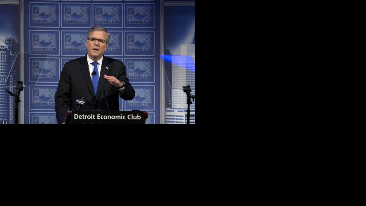 
In this Feb. 4, 2015 file photo, former Florida Gov. Jeb Bush speaks at a Economic Club of Detroit meeting in Detroit. To Democrats, Jeb Bush offers an inviting target reminiscent of Mitt Romney's 2012 presidential campaign: Both opposed the government's rescue of U.S. automakers. Both worked in finance and backed the Wall Street bailout. Both have advocated for tax cuts that Democrats contend benefit the wealthy and big business. Starting the 2016 campaign, Democrats want to turn the former Florida governor into a carbon copy of Romney, who struggled against an onslaught of criticism related to his work in private equity and his portrayal by President Barack Obama's allies as a cold-hearted plutocrat. 
