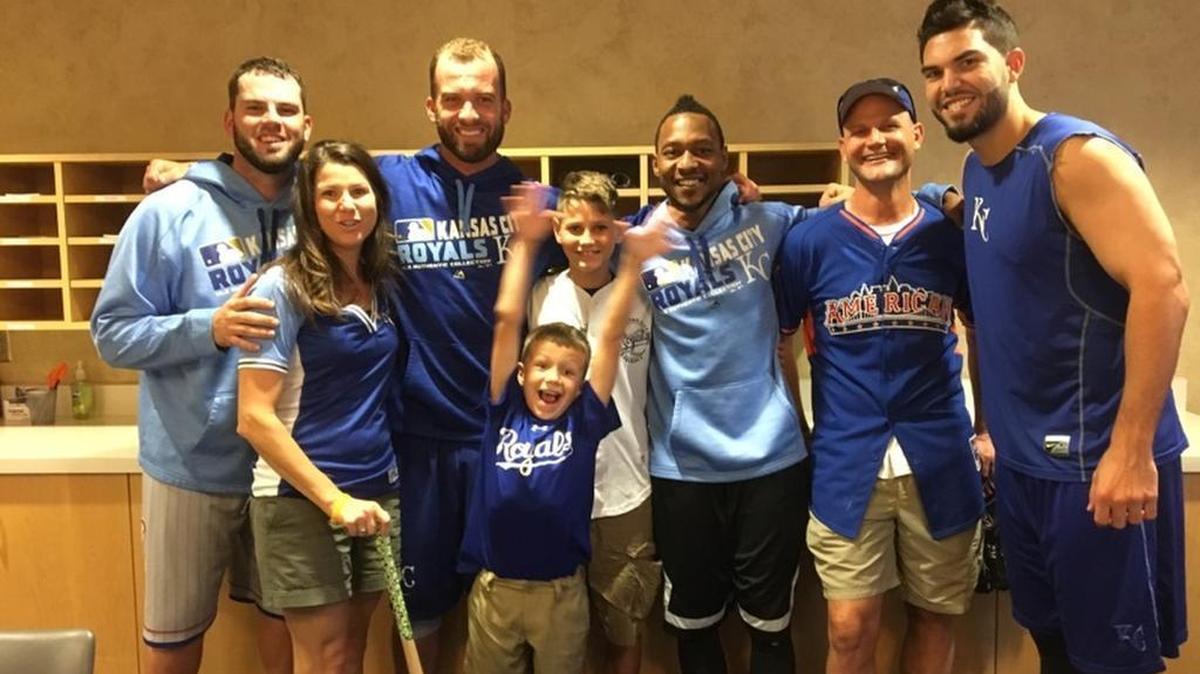 The Schwab family: Michelle (second from left), Alex (center foreground), Nathan (center background) and Scott (second from right) met Royals players including Mike Moustakas, Alex Gordon, Jarrod Dyson and Eric Hosmer in August.