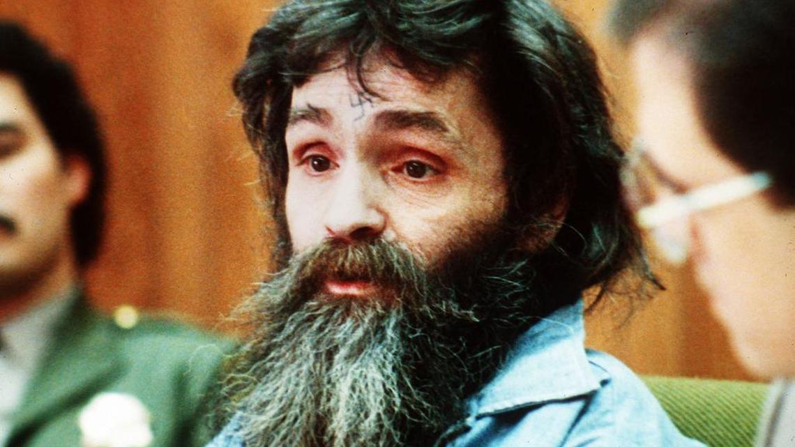 Charles Manson, a cult leader convicted of orchestrating the murder of at least five people, pictured here in 1986, died in prison Sunday.