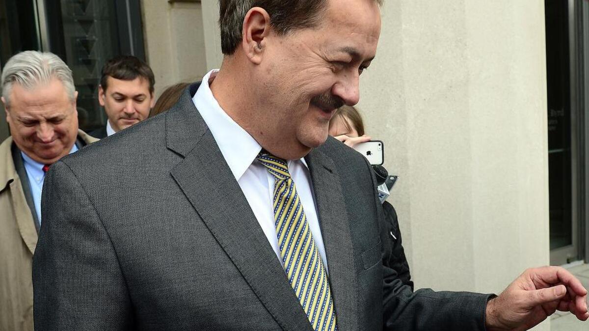 Don Blankenship leaves the federal courthouse Thursday, Dec. 3, 2015, after the verdict in his trial in Charleston, W.Va. The former Massey Energy CEO was convicted Thursday of a misdemeanor count connected to a deadly coal mine explosion and acquitted of more serious charges. A federal jury in West Virginia convicted Blankenship of conspiring to willfully violate mine safety standards. The misdemeanor charge carries up to one year in prison. He was acquitted of a more serious conspiracy charge that could have netted five years in prison. He was also acquitted of making false statements and securities fraud.