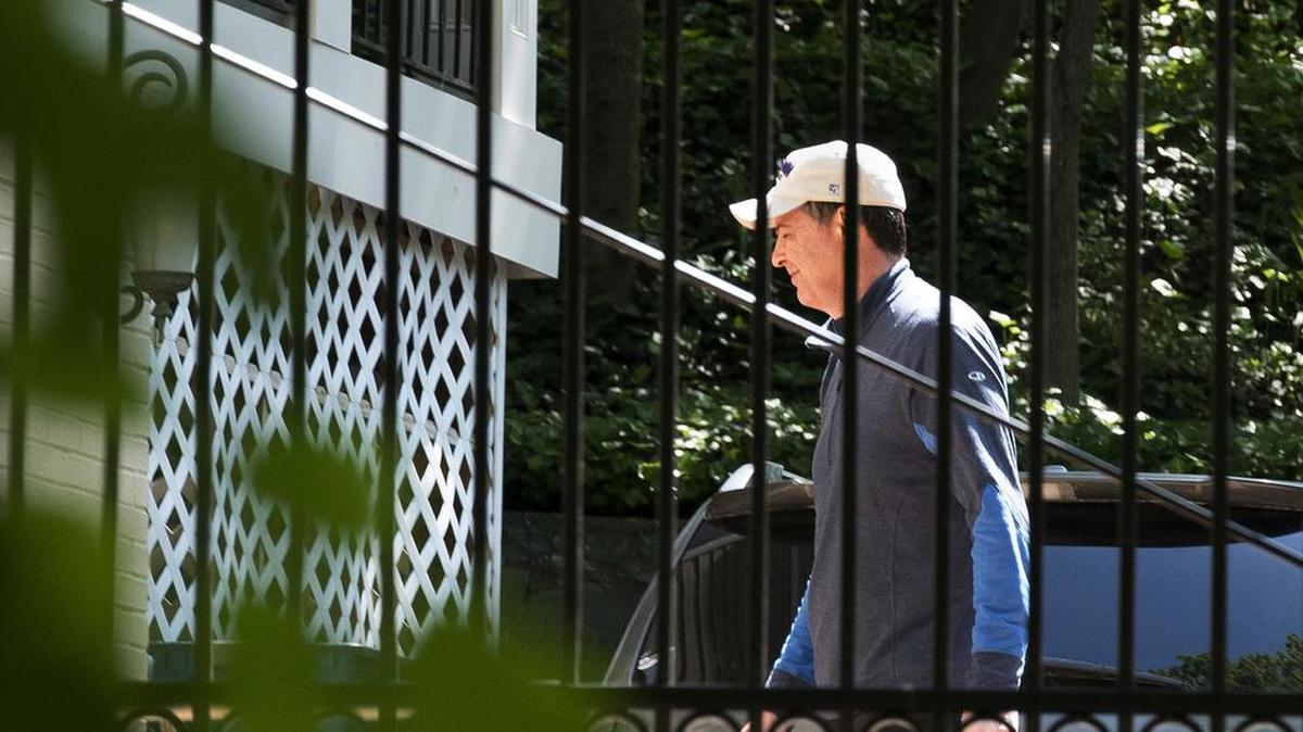 Former FBI Director James Comey walks at his home in McLean, Va., Wednesday, May 10, 2017. President Donald Trump fired Comey on Tuesday, ousting the nation's top law enforcement official in the midst of an investigation into whether Trump's campaign had ties to Russia's election meddling.