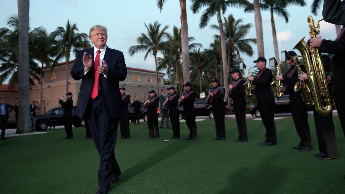 President Donald Trump was serenaded by the Palm Beach Central High School Band when he arrived at the Trump International Golf Club in West Palm Beach, Florida, on Sunday, Feb. 5, 2017. Japanese Prime Minister Shinzo Abe is expected to travel to Florida with Trump for a weekend stay and a round of golf.