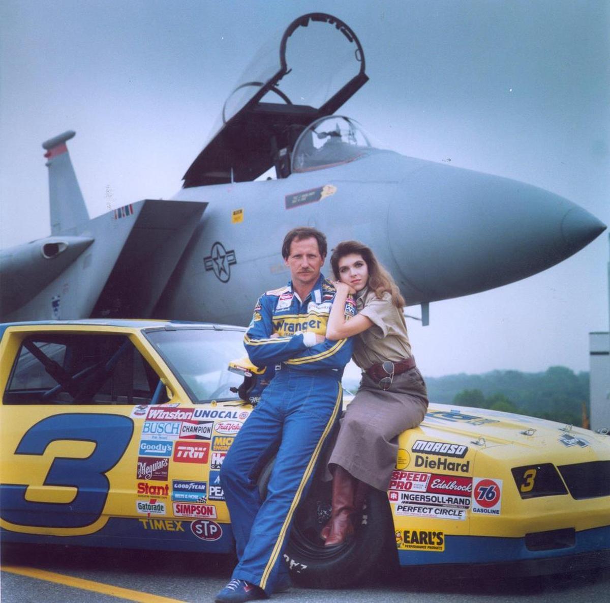 Dale Earnhardt and his third wife, Teresa, posed in 1987 with his famous No. 3 Chevy alongside an Air Guard jet fighter.