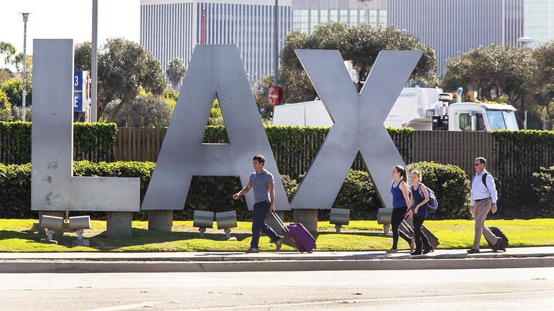 Federal authorities are searching for a flight attendant they say bolted from a security screening at Los Angeles International Airport, leaving behind about 70 pounds of cocaine stashed in her luggage.