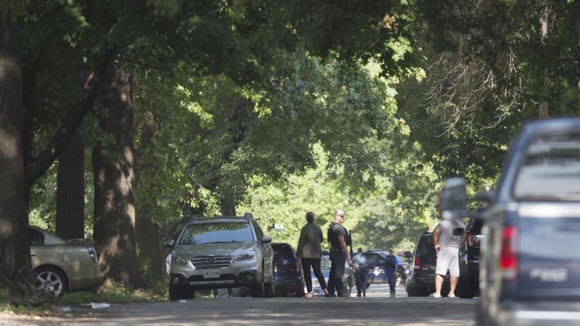 Kansas City police and U.S. Marshals Services worked together as they blocked off East 77th Terrace street near Troost Avenue as they follow through with an investigation Sunday afternoon.