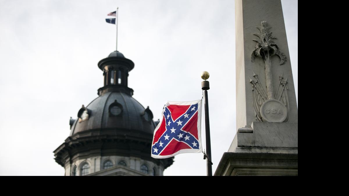 
A Confederate battle flag flies in front of the South Carolina statehouse Wednesday, July 8, 2015, in Columbia, S.C. The House is voted Wednesday to remove the flag from the capitol grounds.
