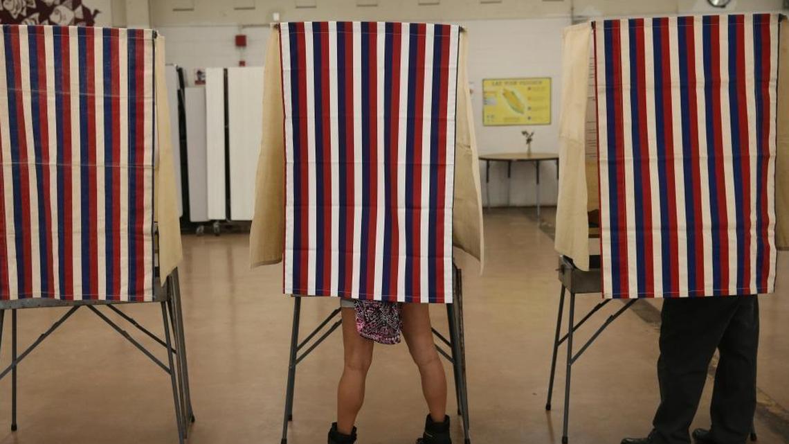 Voters cast their ballots at Farrington High School on Nov. 8, 2016, in Honolulu. This November, the Supreme Court will hear a case on Ohio’s method of purging names from its voter rolls, which opponents say is overly aggressive.