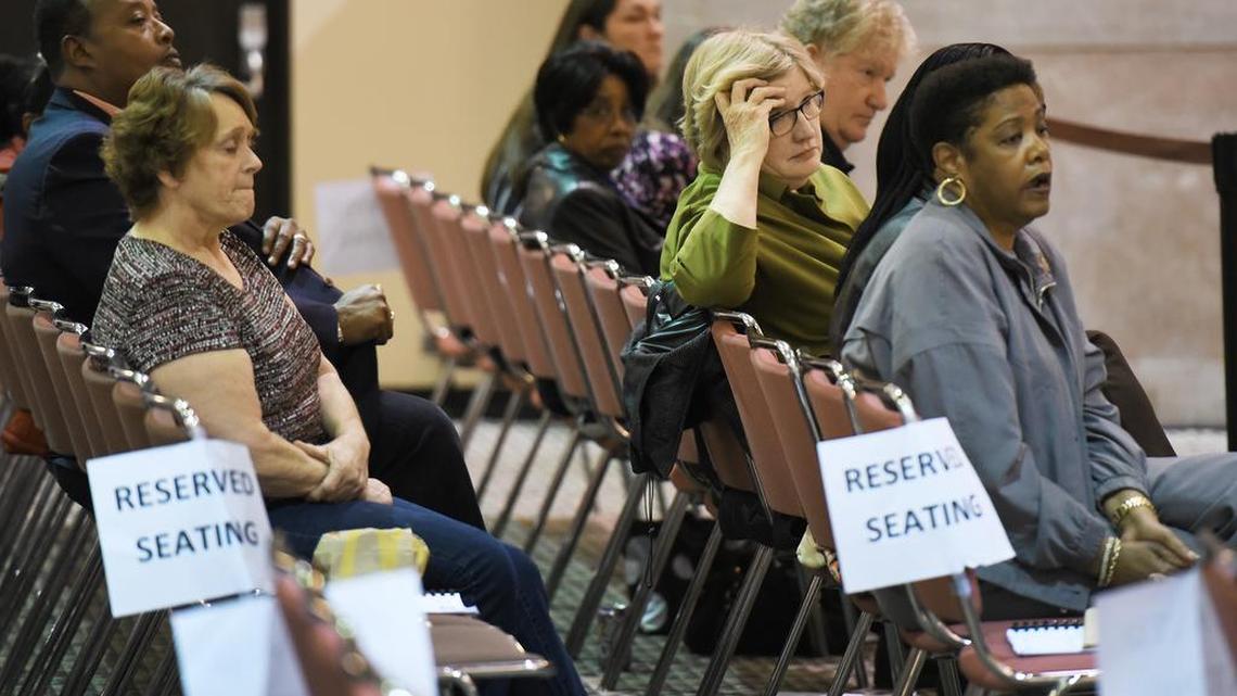 Family members of the lost crew members of the El Faro listen to recordings of a phone call between the U.S. Coast Guard and Capt. John Lawrence from Tote Services Inc. which took place after the El Faro's captain reported that the ship was taking on water Feb. 20, 2016, during a U.S. Coast Guard investigative hearing in Jacksonville, Fla.