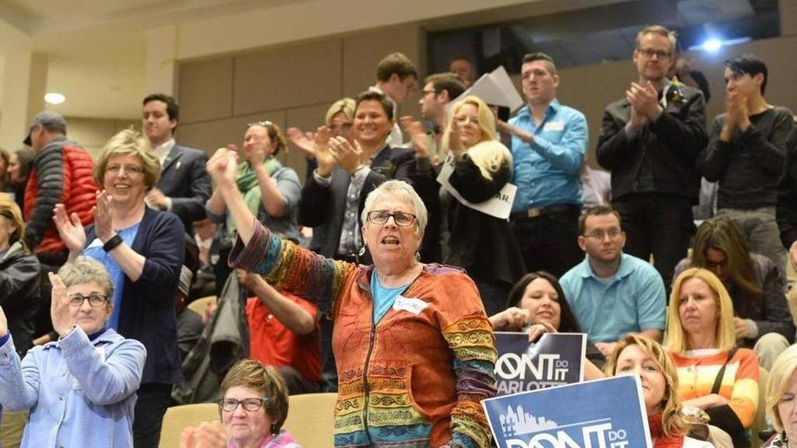 Some cheer after the Charlotte City Council approved LGBT protections in 7-4 vote.