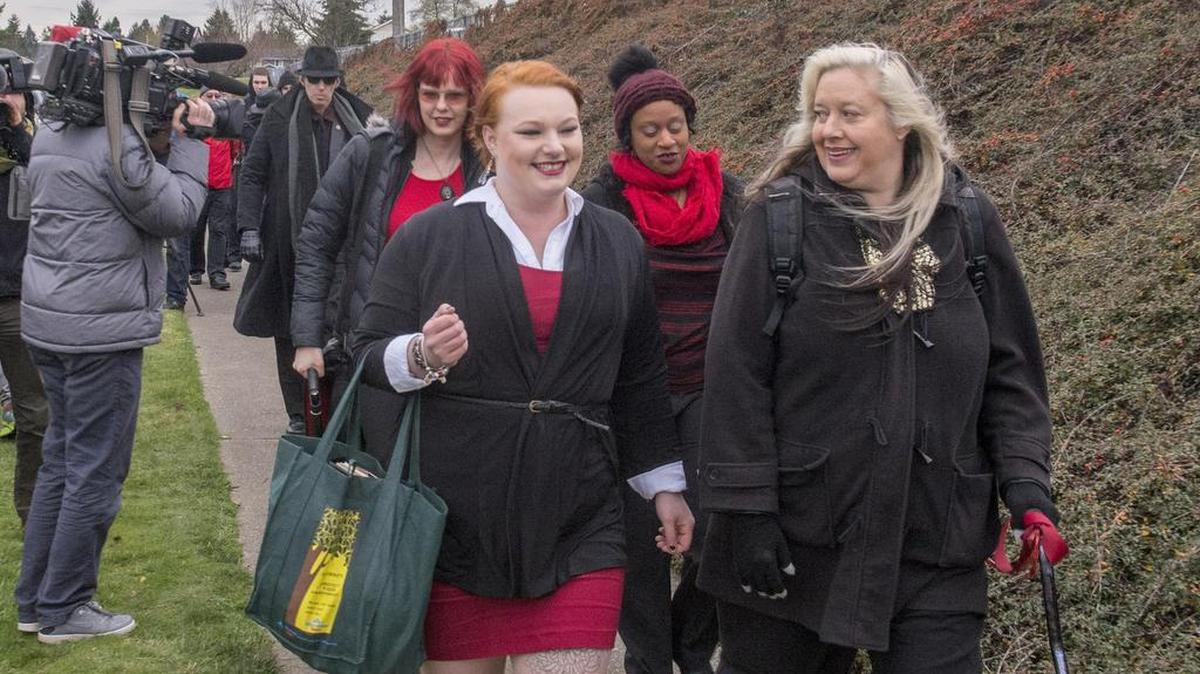 Teachers from the Seattle Satanic Temple, from right, Lilith Starr, Vapula Lix, Erin Botello and Violet Black arrive Wednesday at Point Defiance Elementary School to offer their first After School Satan Club in Tacoma.
