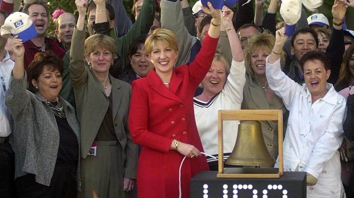 
In this May 6, 2002, photo, then-Hewlett Packard Company chief executive Carly Fiorina rang a bell to virtually open the New York Stock Exchange from HP's headquarters in Palo Alto, Calif. HP changed its ticker symbol from HWP to HPQ to reflect its recent $19 billion acquisition of Compaq Computer Corp. Ten years after GOP presidential candidate Carly Fiorina was unceremoniously fired from her job as chief executive of Hewlett-Packard, her tumultuous business career is still the subject of heated debate.
