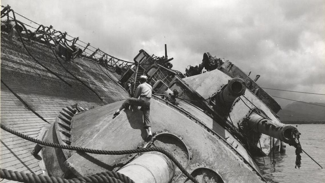 The USS Oklahoma was sunk by several bombs and torpedoes during the Japanese attack on Pearl Harbor, hawaii. A total of 429 crew died when the ship capsized. The Oklahoma was righted and salvaged in 1943 and the remains of many crew members were recovered. However, unlike most of the other battleships that were recovered following Pearl Harbor, the Oklahoma was too damaged to return to duty. She was eventually stripped of her remaining armaments and superstructure before being sold for scrap in 1946.