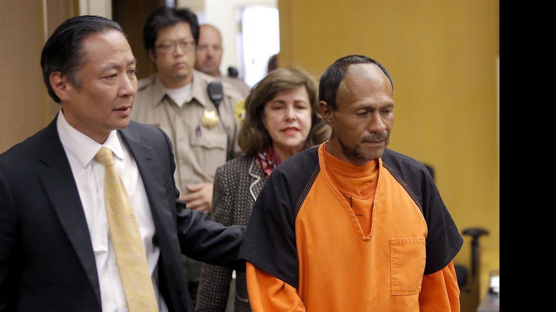 
Juan Francisco Lopez-Sanchez, right, is lead into the courtroom by San Francisco Public Defender Jeff Adachi, left, and Assistant District Attorney Diana Garciaor, center, for his arraignment at the Hall of Justice in San Francisco on July 7. More than 1,800 immigrants that the federal government wanted to deport were nevertheless released from local jails and later re-arrested for various crimes, according to a government report released Monday.
