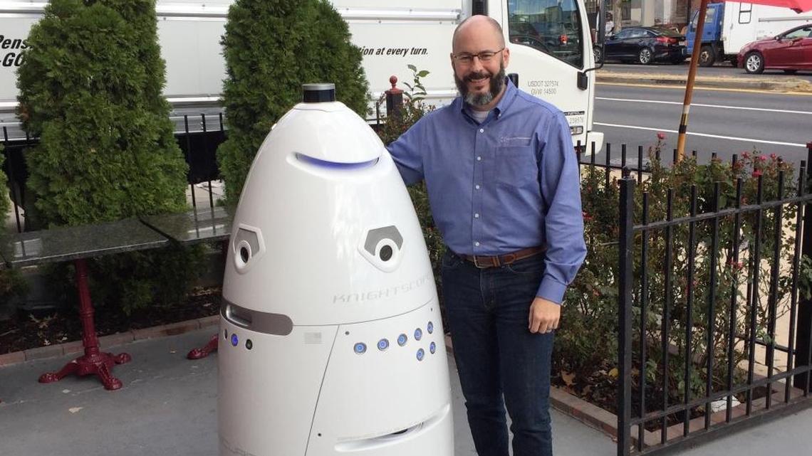 Stacy Dean Stephens, cofounder of the start-up Knightscope, shows off K5, one of the Mountain View, California, company’s autonomous self-propelled robots. The K5 robot is designed for outdoor use, and can do video and thermal imaging, read license plates, detect humans in areas that are off limits, and emit escalating alarms if attacked.