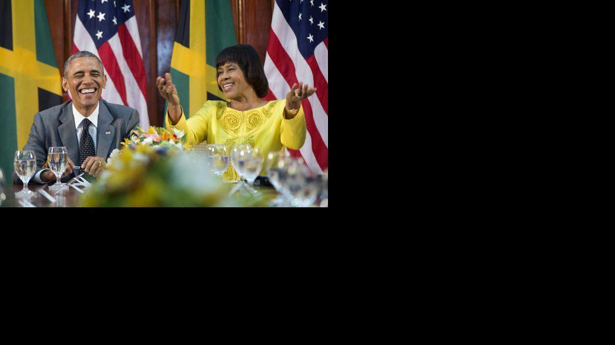 
Most of the black migration in Miami and across the country has come from the Caribbean where President Barack Obama, seen here with Jamaican Prime Minister Portia Simpson-Miller, traveled this week on the first presidential visit to Jamaica in three decades.
