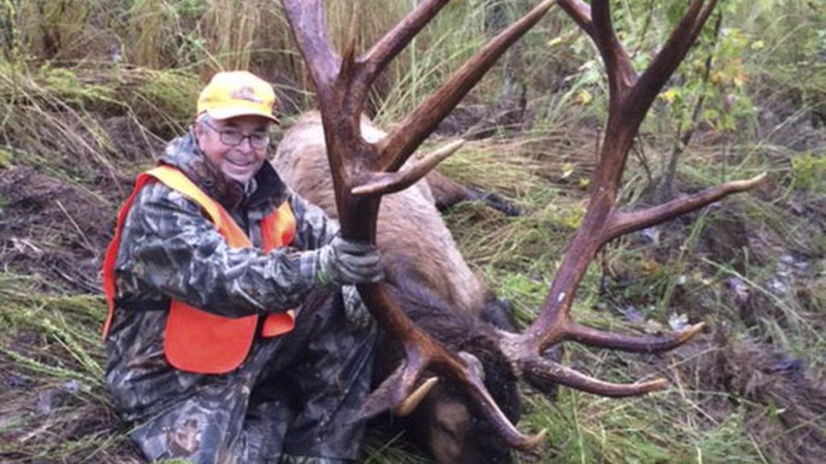 David Giles of Lexington with the state-record elk he bagged on Oct. 3 in Knott County. The elk had the largest antlers of any elk since they were restocked in the state in the late 1990s.