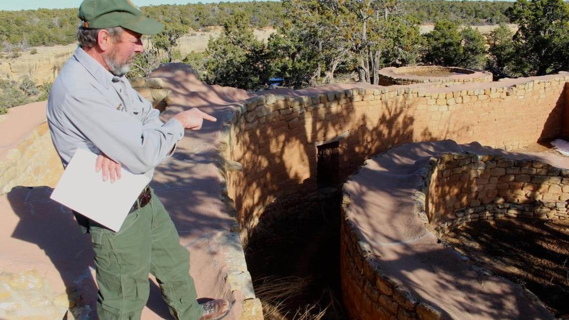 Tim Hovezak, an archaeologist at Mesa Verde National Park, points out some of the mysterious features of the Sun Temple, which overlooks the Cliff Palace and some of the park's other popular attractions in southwest Colorado.