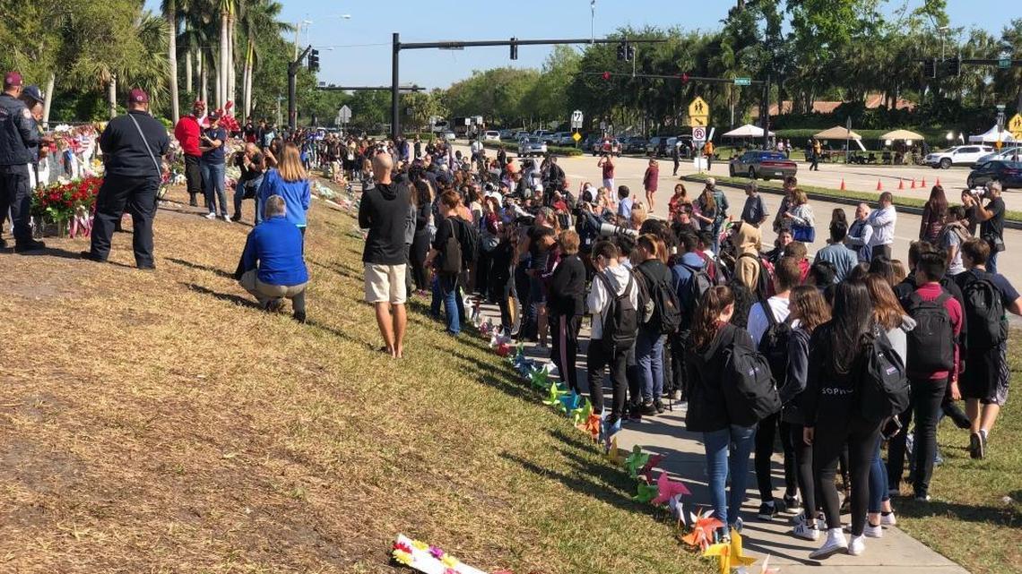 Students from Marjory Stoneman Douglas High School gather to honor the memories of 17 classmates that were killed when the school was attacked. The students are part of a larger National Walk out day.