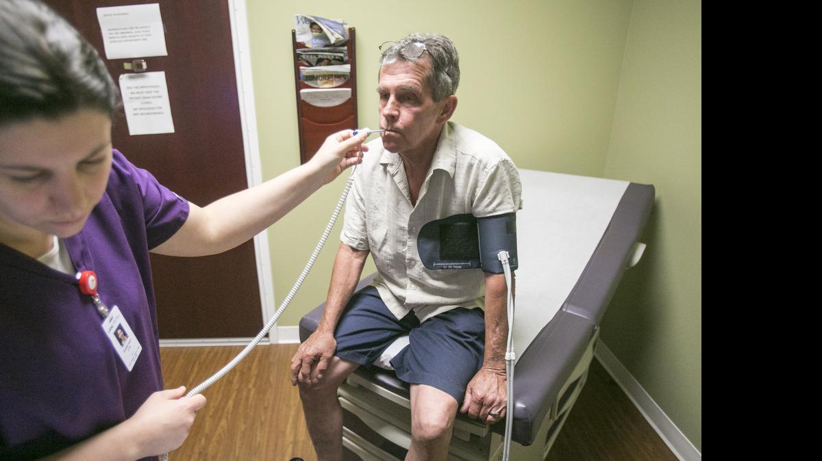 
Terry Brewster, 56, visits Dr. Paul Cohen at Little River Medical Center in Little River, S.C., on June 15, 2015. Brewster is dealing with rheumatoid arthritis and a torn rotator cuff, and is concerned that if he loses his Affordable Care Act subsidies, he will no longer be able to afford medical coverage or get shoulder surgery. The possible loss of subsidies under the Affordable Care Act would have a disproportionate impact on the southern states, which are among the nation’s most impoverished.
