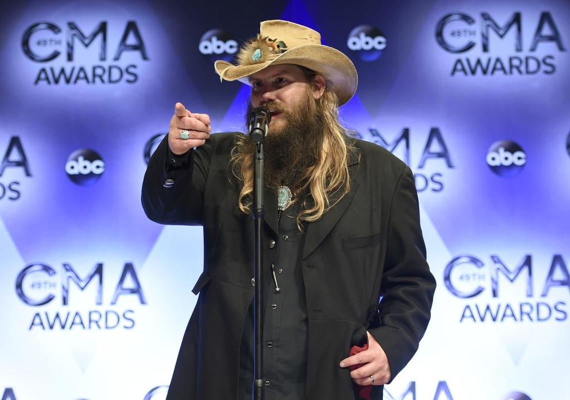 Chris Stapleton, winner of the awards for new artist of the year, album of the year for “Traveller,” and male vocalist of the year, participates in an interview in the press room at the 49th annual CMA Awards at the Bridgestone Arena on Wednesday, Nov. 4, 2015, in Nashville, Tenn.