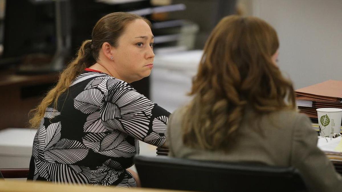Brittany Phillips, left, stands trial in September on a charge of causing serious bodily injury to her daughter. The trial ended in a hung jury.
