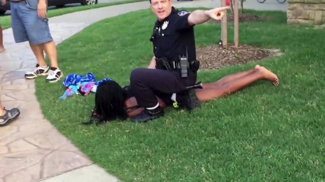 McKinney police Cpl. Eric Casebolt is shown in a screen shot from video of an altercation in which he pulled his gun on a group of teenagers at a pool party. A witness, Brandon Brooks, uploaded this video of the incident to YouTube. In a recent 5th Circuit Court of Appeals ruling, Justice Jacques Wiener wrote: “Protecting the right to film the police promotes First Amendment principles.”