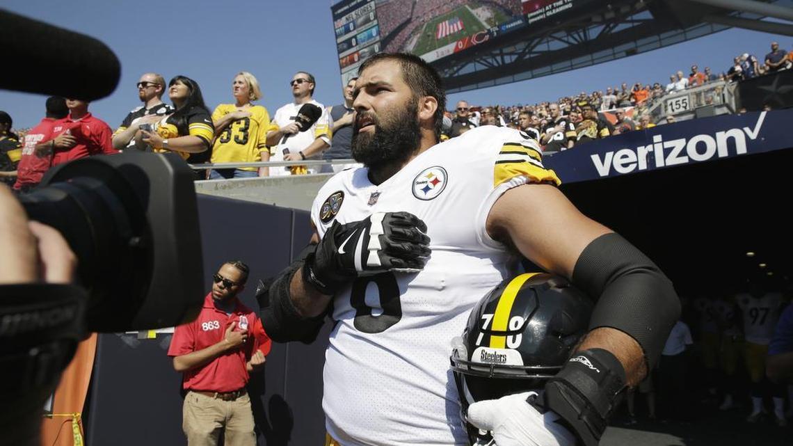 Pittsburgh Steelers offensive tackle and former Army Ranger Alejandro Villanueva stands outside the tunnel alone during the national anthem before an NFL football game against the Chicago Bears on Sunday in Chicago.