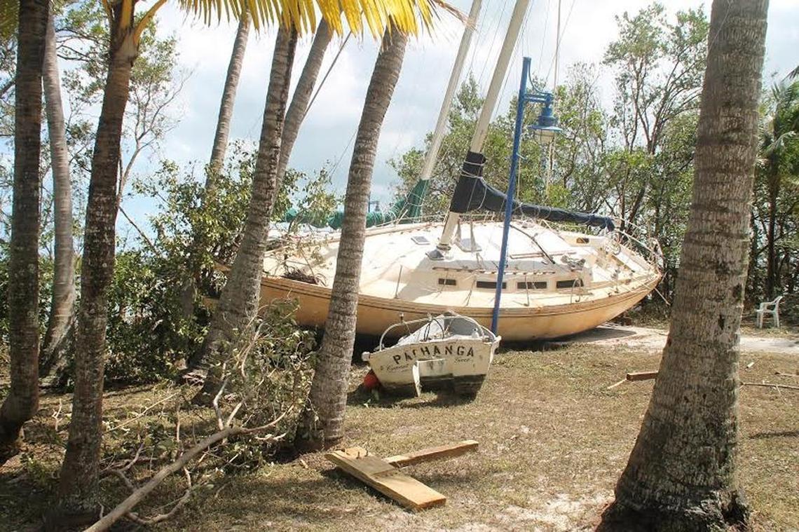 Two sailboats and a dinghy are stranded in Peacock Park in Coconut Grove after being washed ashore during Hurricane Irma.