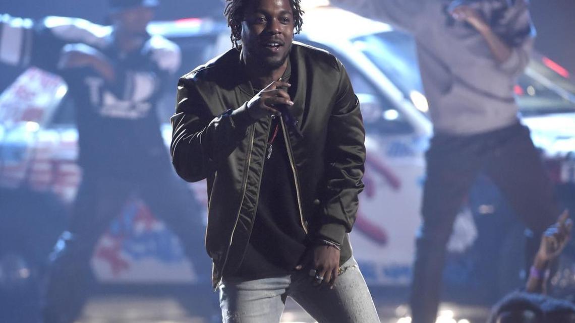 In this Sunday, June 28, 2015, file photo, Kendrick Lamar performs at the BET Awards at the Microsoft Theater in Los Angeles. Lamar, Taylor Swift and the Weeknd have earned top nominations for the 2016 Grammy Awards, including album of the year.