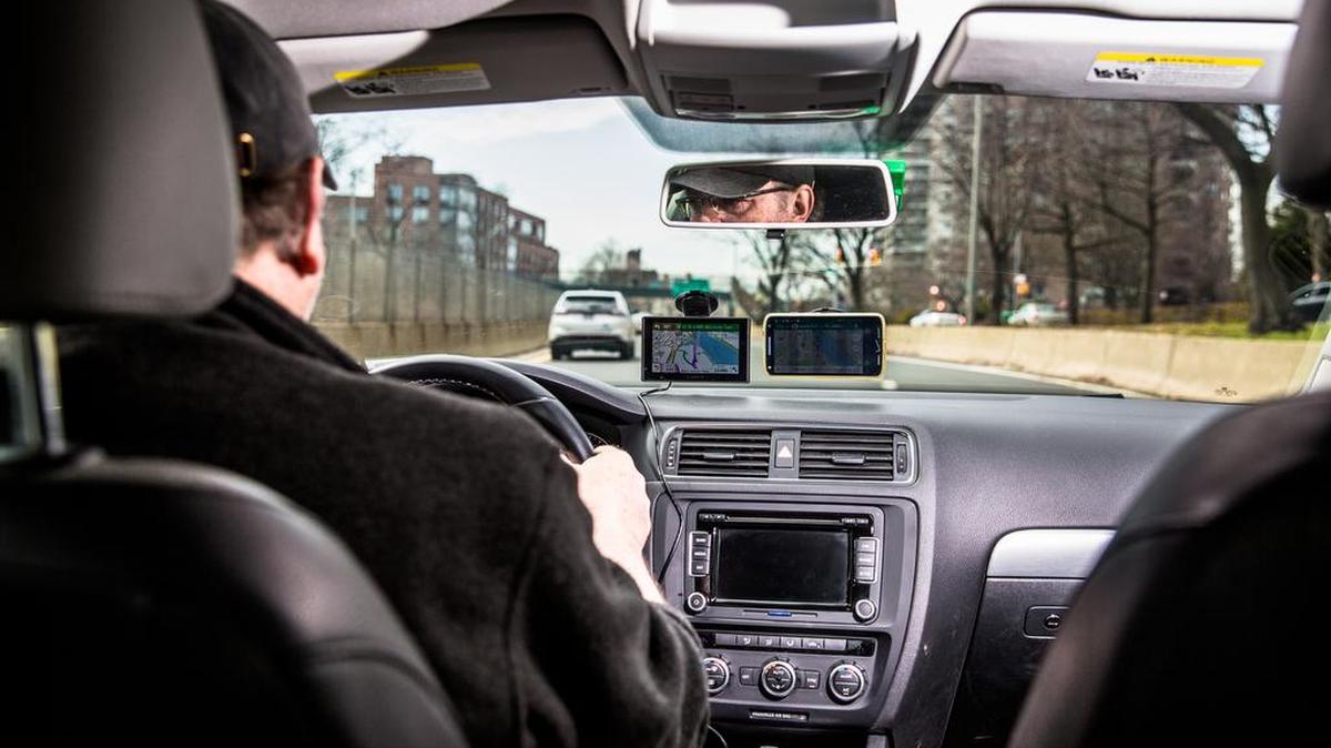Rik Paul tests GPS systems in New York in April. Another driver found herself in trouble Sunday night when her GPS navigator led her straight into a river.