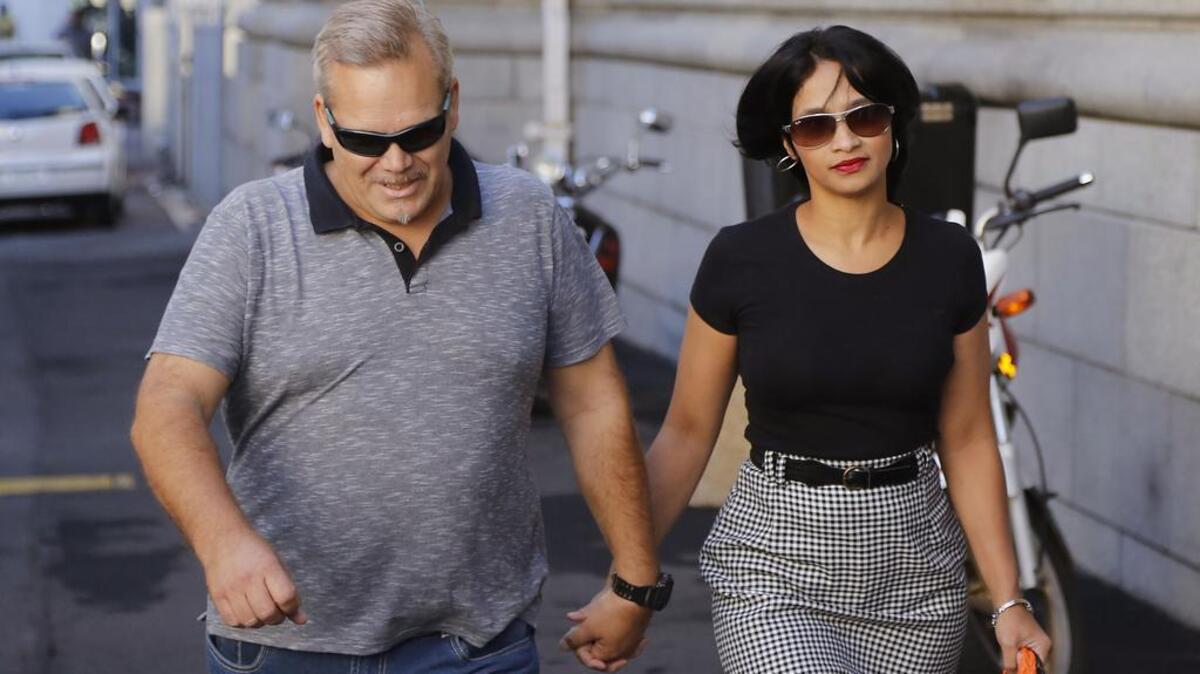 Celeste Nurse, right, the mother of a girl kidnapped as a baby nearly 19 years ago, arrives at court for the appearance of a South African woman suspected of the kidnapping in Cape Town, South Africa, Tuesday, Feb. 23, 2016.