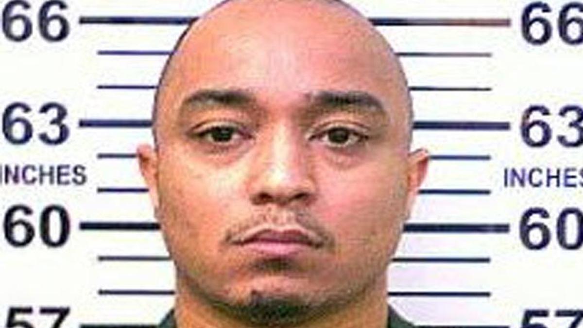 This 2014 photo provided by the New York Department of Corrections shows Tyrone Howard, who is in police custody and suspected in the killing of New York City Police Department Officer Randolph Holder, who was shot dead Tuesday night, Oct. 21, 2015 during an exchange of gunfire in East Harlem.