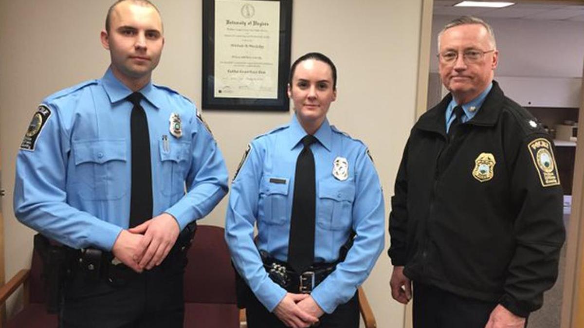 A photo provided by the Prince William County Police Department shows, from the left, officers Steven Kendall and Ashley Guindon with Lt. Col. Barry Bernard, deputy chief of the Prince William County, Va., Police Department. Officer Ashley Guindon was shot and killed Saturday, Feb. 28, 2016, and two unnamed colleagues were wounded in a confrontation stemming from a call about an argument. Guindon and Kendall were sworn in on Friday, and Guindon was working her first shift with the Prince William County Police Department when she was killed.