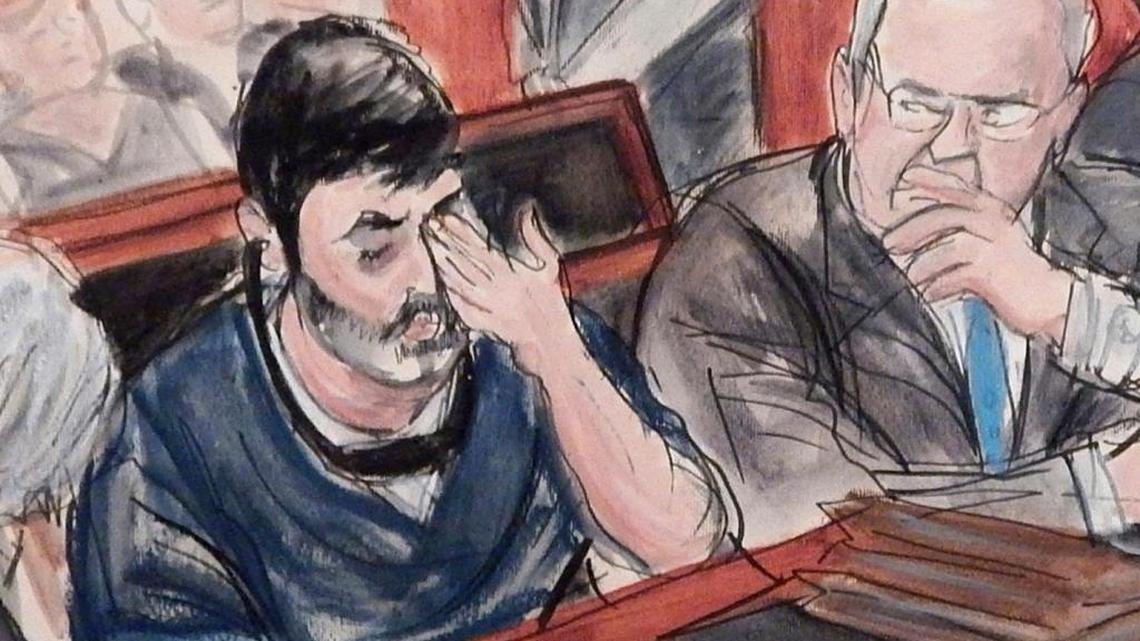 Efrain Antonio Campo Flores has an emotional reaction as he is flanked by his attorneys while appearing with his cousin Franqui Francisco Flores De Freitas, unseen, in Manhattan federal court at their arraignment on cocaine-smuggling charges in New York on Dec. 17, 2015.