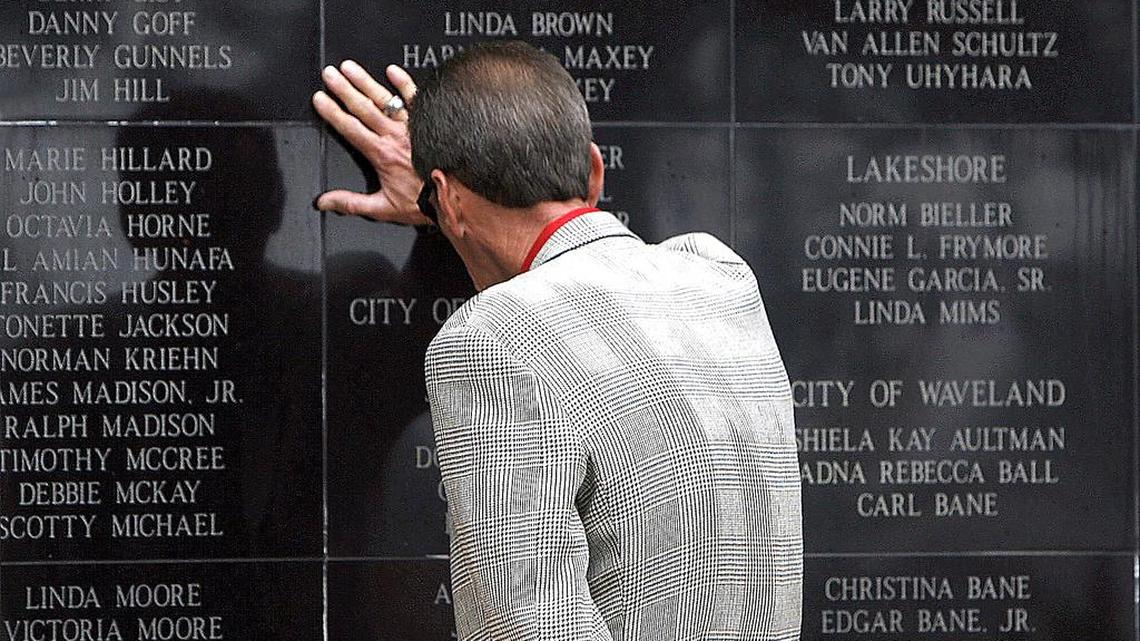 
Harrison County coroner Gary Hargrove pauses for a moment at the Hurricane Katrina monument in Biloxi. The Katrina monument is 12-feet tall representing the height of the storm surge that hit the town.
