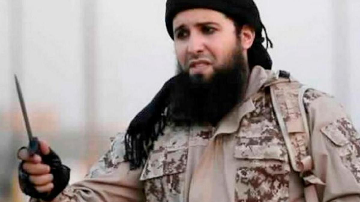 An image grab taken from a video made available by jihadi media outlet Welayat Nineveh on July 20, 2016, allegedly shows Rashid Kassim, a French member of the Islamic State group, speaking to the camera before beheading two men along with another jihadi.