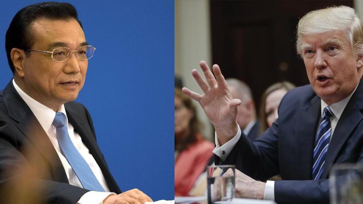 Chinese Premier Li Keqiang, left, told a news conference "We don't want to see any trade war breaking out between the two countries. That wouldn't make our trade fairer." President Donald Trump had been critical of China during his campaign.