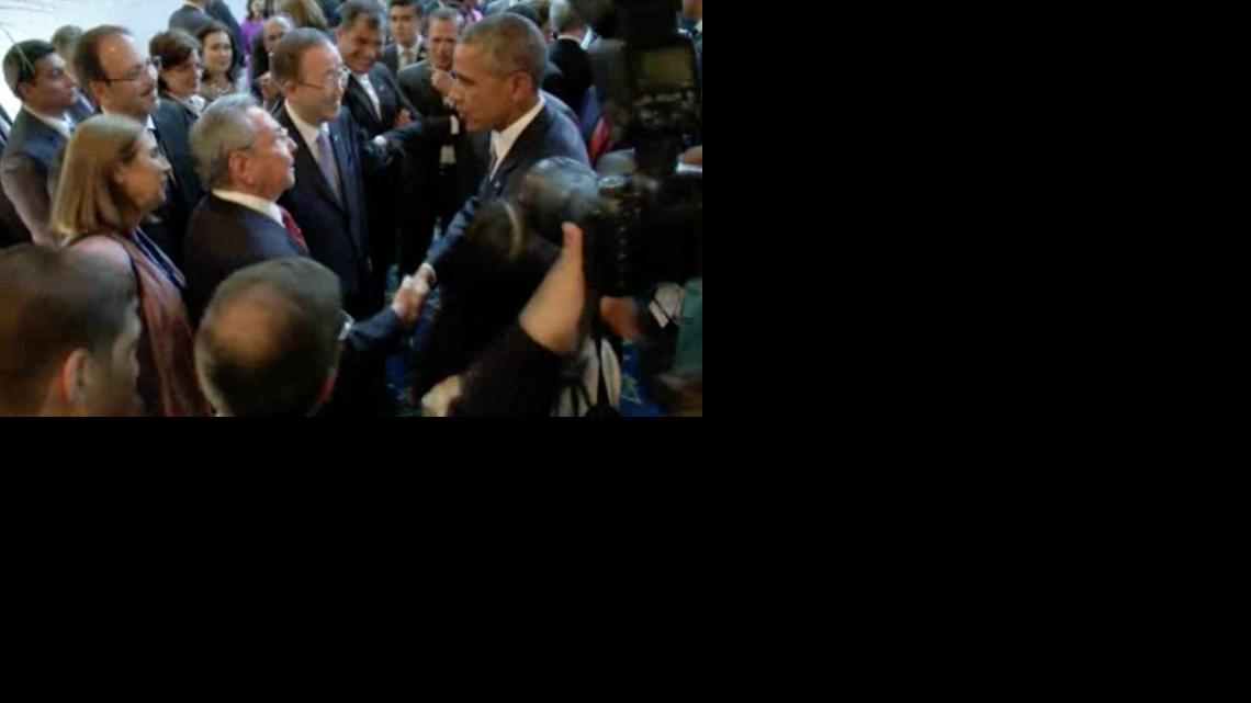 
This image from the host broadcaster pool video shows U.S. President Barack Obama and Cuban President Raul Castro exchange handshakes on Friday, April 10, 2015, at the opening of the Summit of the Americas in Panama.
