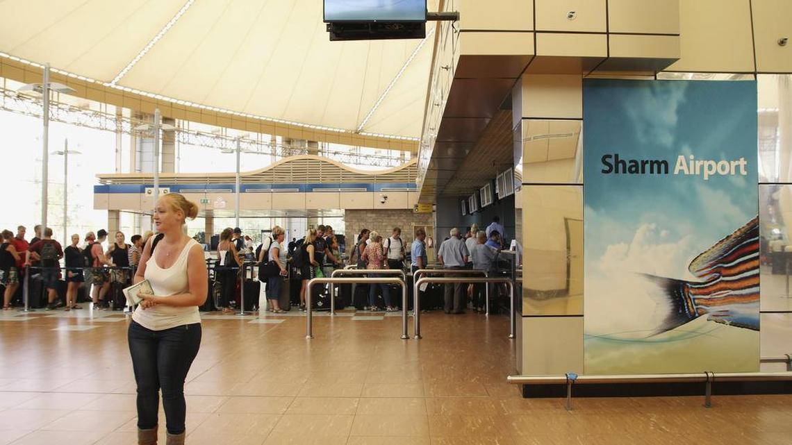 Tourists wait in the departure hall to be evacuated from Sharm el-Sheikh airport, south Sinai, Egypt, Friday, Nov. 6, 2015.