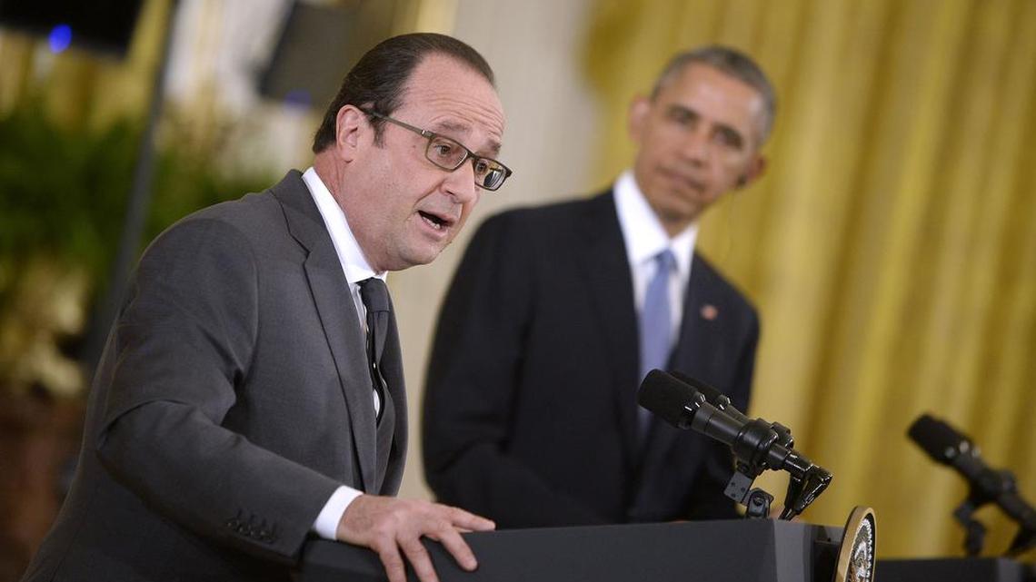 U.S. President Barack Obama and French President Francois Hollande give a joint press conference in the East Room of the White House on Tuesday, Nov. 24, 2015, in Washington, D.C. This is the first time the two leaders have met since the attacks in Paris.