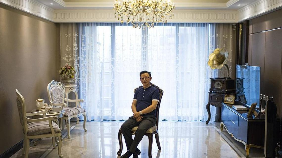 
Long Wenjun, son of Long Qiming, sits in his apartment in Chongqing, China, on Aug. 13, 2015. Wenjun’s father helped defend China as a pilot during World War II. After the Communists came to power, Qiming was suspected of being a spy, because he had been born in British-rule Hong Kong and been trained as a pilot in the United States.

