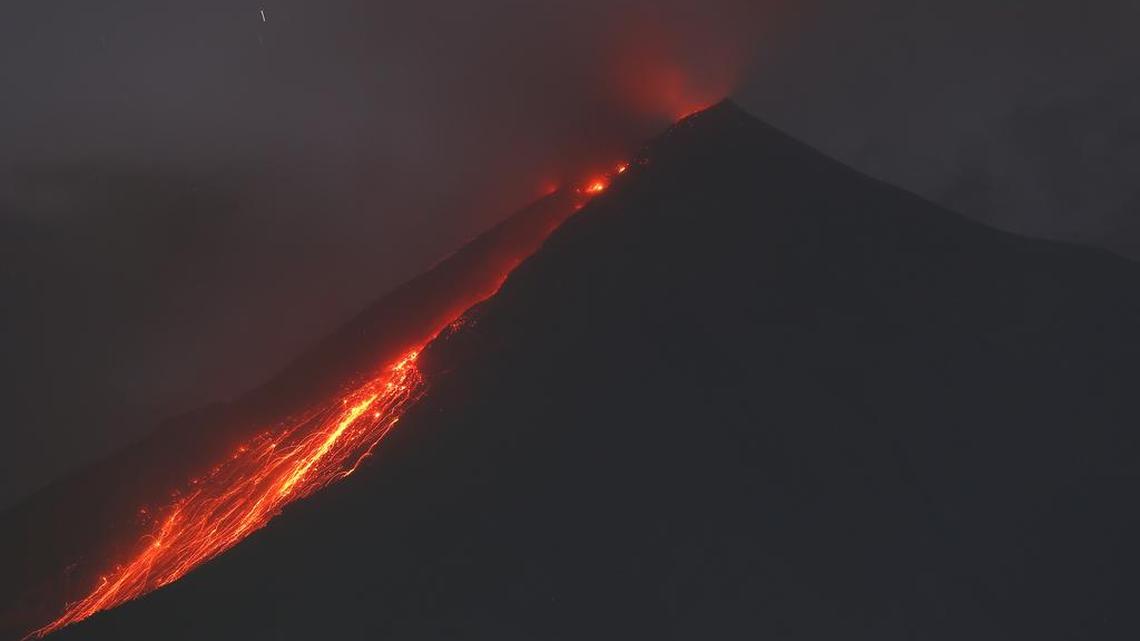 The Volcano of Fire releases lava, seen from San Juan Alotenango, Guatemala, on Monday. Guatemalan authorities are on alert after the country’s Volcano of Fire erupted in dramatic fashion on Sunday. Officials are asking nearby communities to remain vigilant amid a state of yellow alert. In Spanish it’s known as “El Volcan del Fuego.”