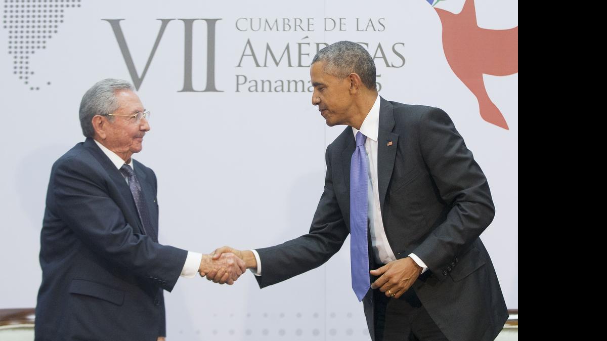 
US President Barack Obama and Cuban President Raul Castro shake hands during their meeting at the Summit of the Americas in Panama City, Panama, Saturday, April 11, 2015. 
