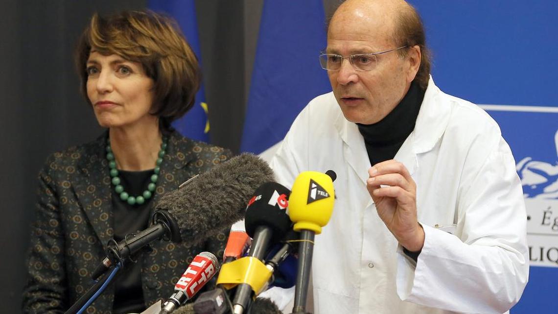 French Health Minister Marisol Touraine, left, and Professor Gilles Edan, the chief neuroscientist at Rennes Hospital, address the media during a press conference held in Rennes, western France, Friday, Jan. 15, 2016. Six previously healthy medical volunteers have been hospitalized — including one man who is now brain dead — after taking part in a botched drug test at the Biotrial lab in western France, the French Health Ministry said Friday.