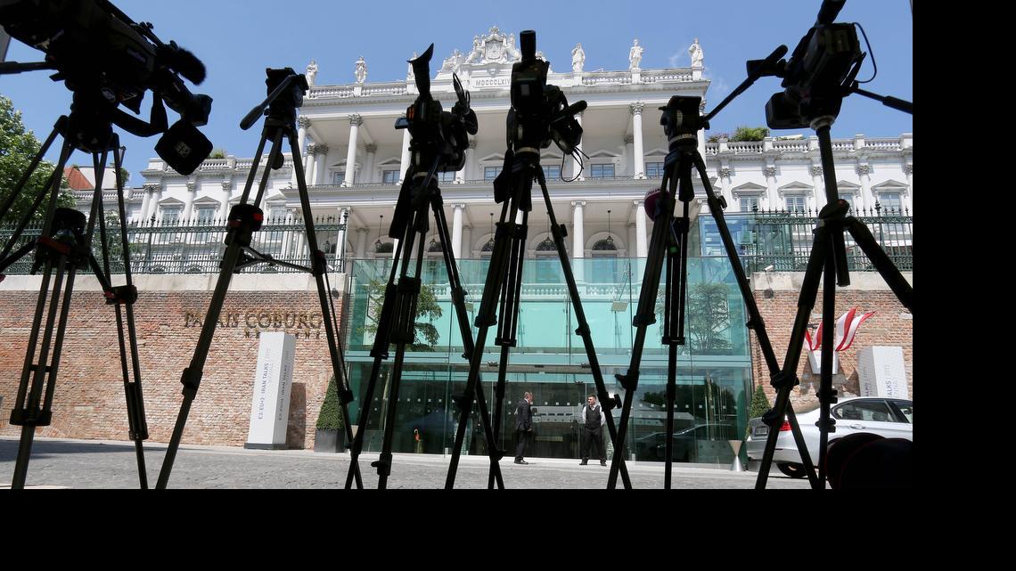 
TV cameras stand in front of Palais Coburg where closed-door nuclear talks with Iran take place in Vienna, Austria, Friday June 26, 2015.
