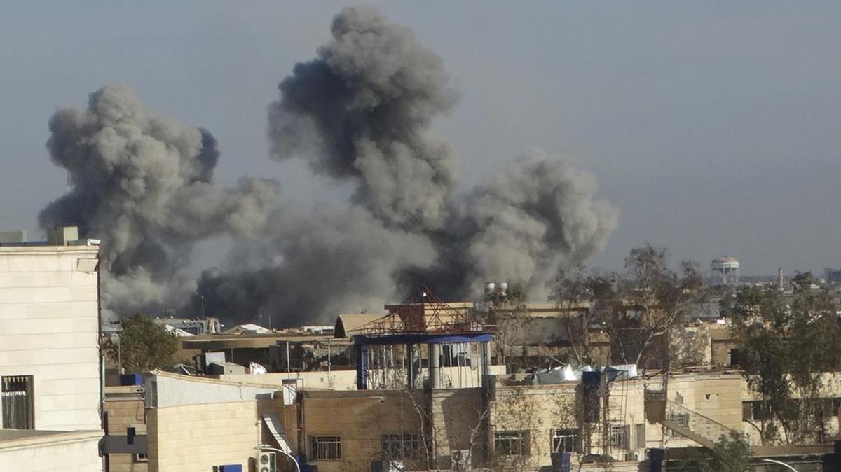 Smoke rises from Islamic State positions following a U.S.-led coalition airstrike in Ramadi on Dec. 2. A different U.S.-led coalition airstrike near Fallujah on Friday wounded and killed Iraqi soldiers battling militants.